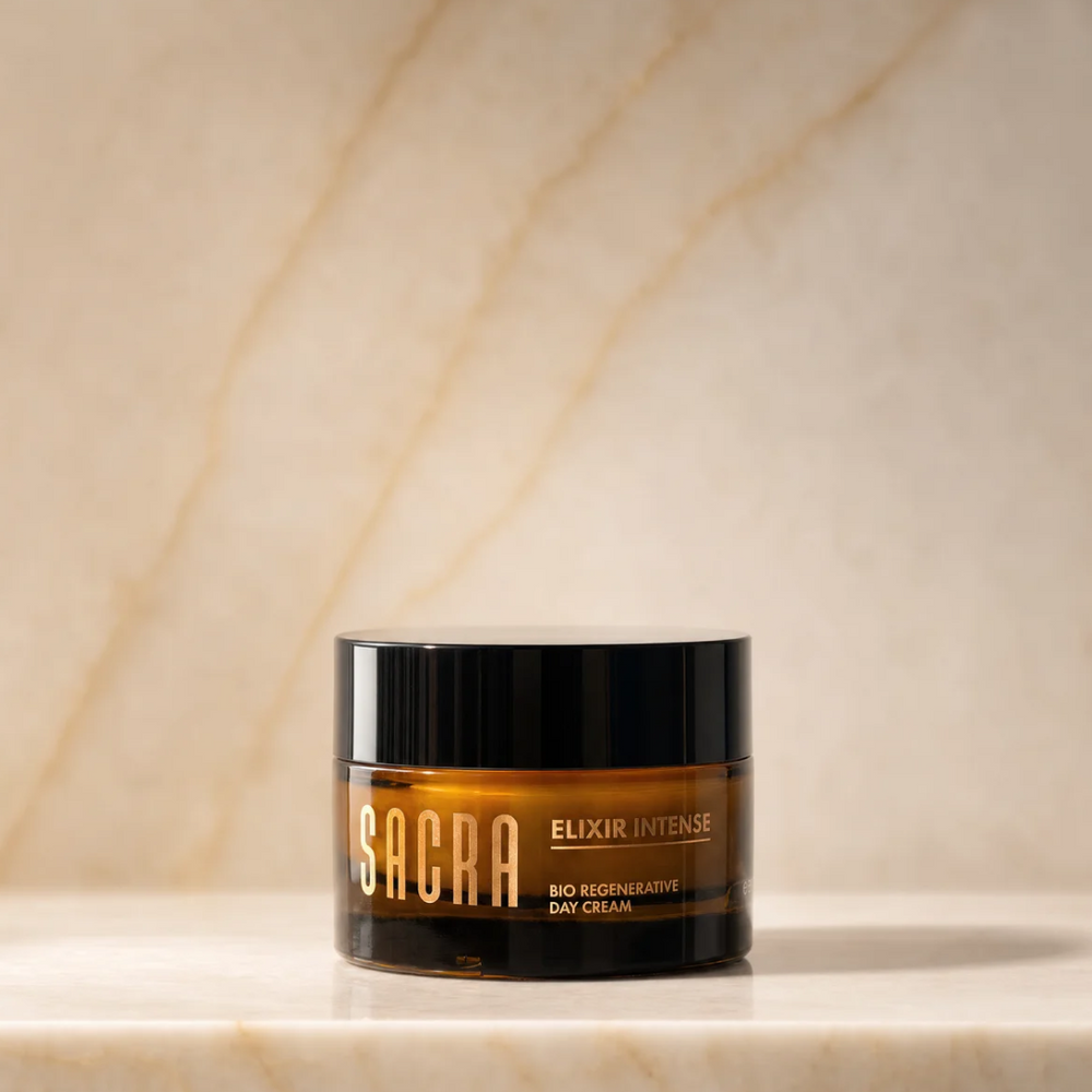 SACRA Elixir Intense Bio Regenerative Day Cream, amber glass jar on marble